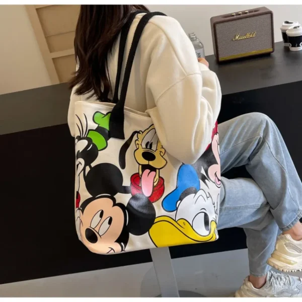 kf-S13a0fe97e0494615916d83ce12c17e17D-DisneyCartoon-Mickey-Fashion-Versatile-LargeCapacity-Canvas-Shoulder-Bag-Women-s-Casual-Versatile-Tote-Bag-Student-Class